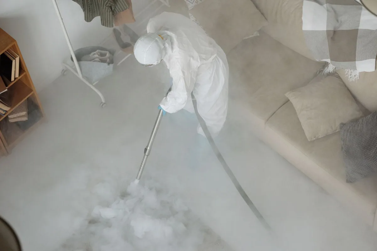 Biohazard cleanup technician in protective equipment, Kensington, San Diego, CA